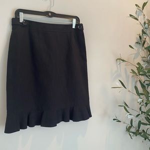 Black pencil skirt with button detail